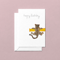 Birthday card with a leopard design and 'happy birthday' text on a pink background