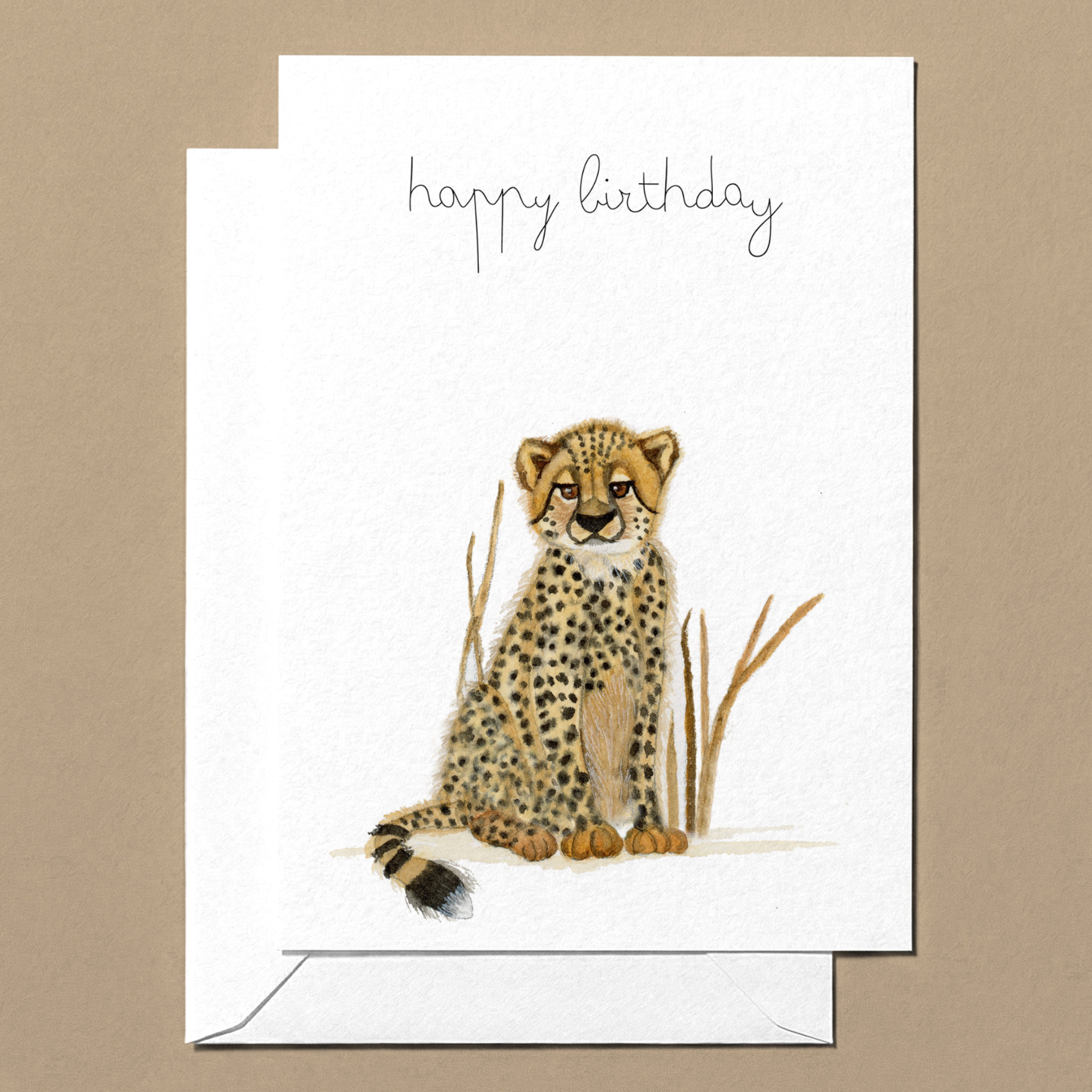 Greeting card with a cheetah watercolour illustration and 'happy birthday' text on a beige background