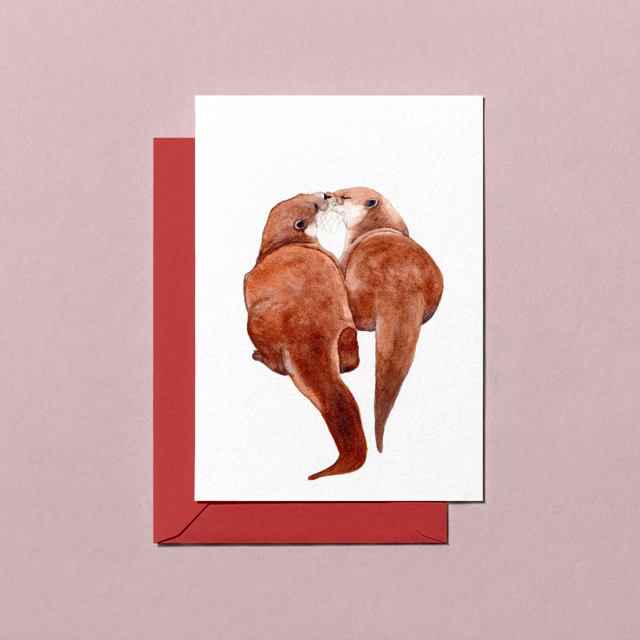 Card with two otters embracing on a white background, featuring a red envelope.