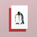 Greeting card with a penguin illustration on a pink background
