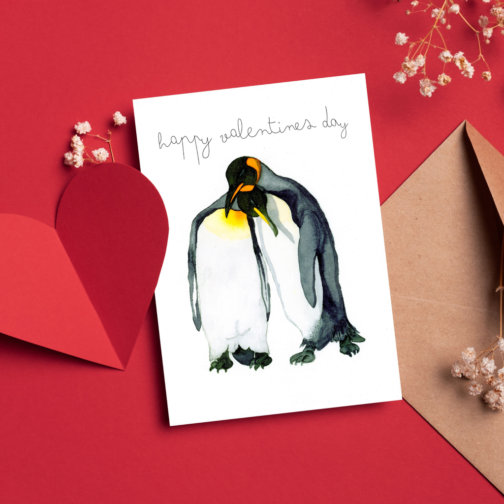 Valentine's Day card with penguin illustration on a red background